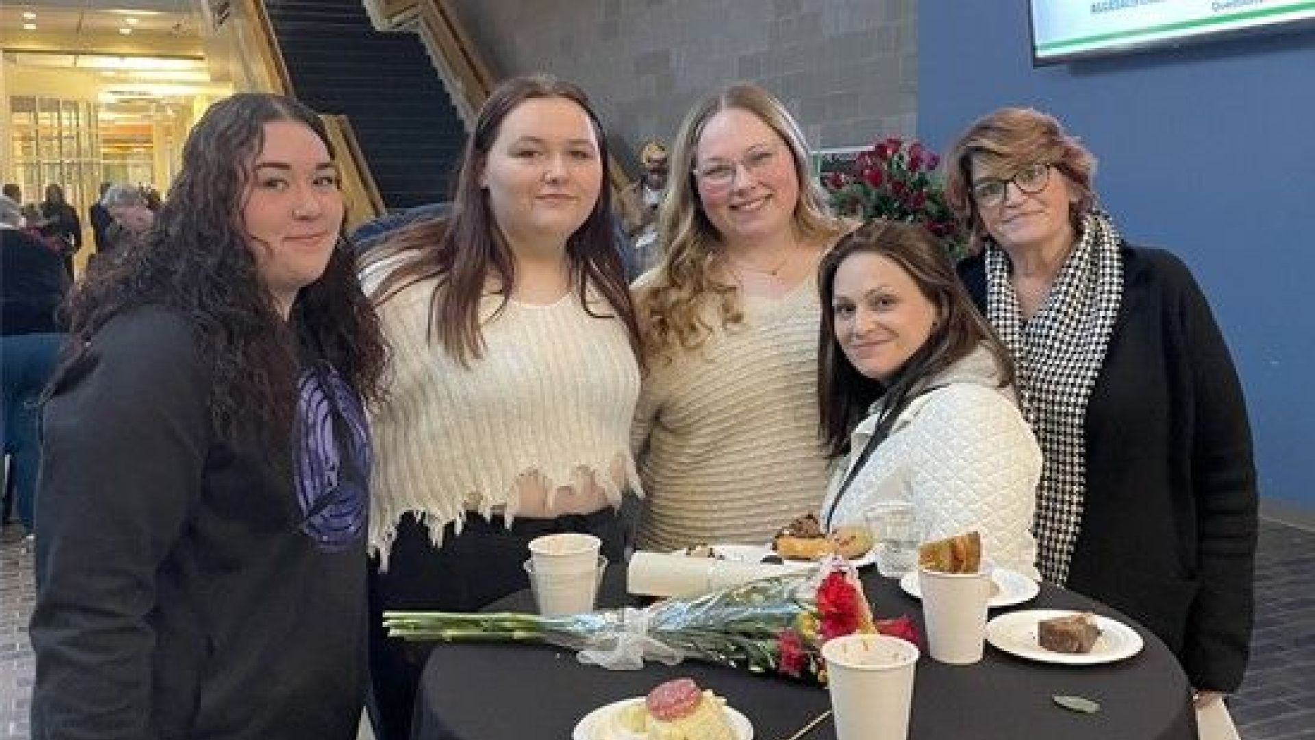 Students at reception with family