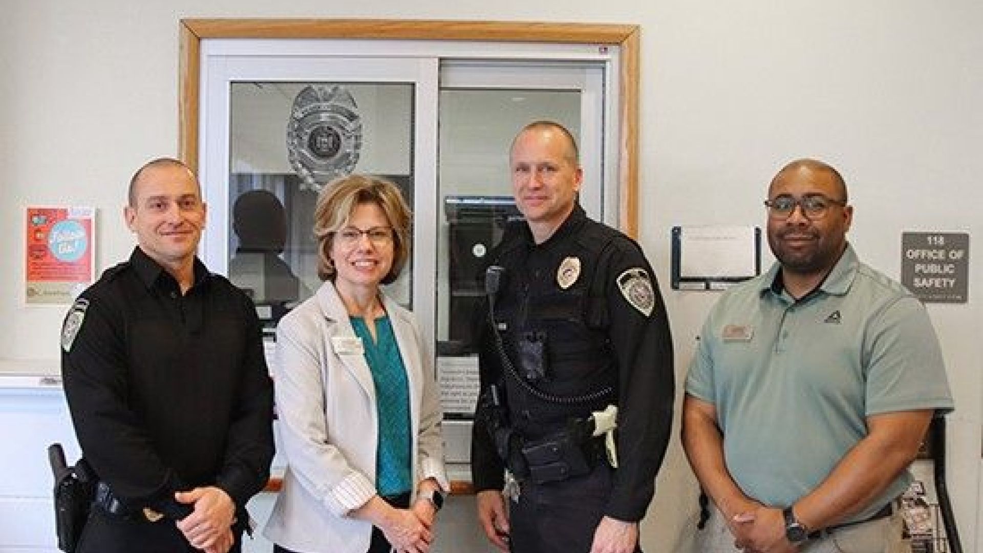 Officer Mike Thornton Receiving Award from President Kremenek