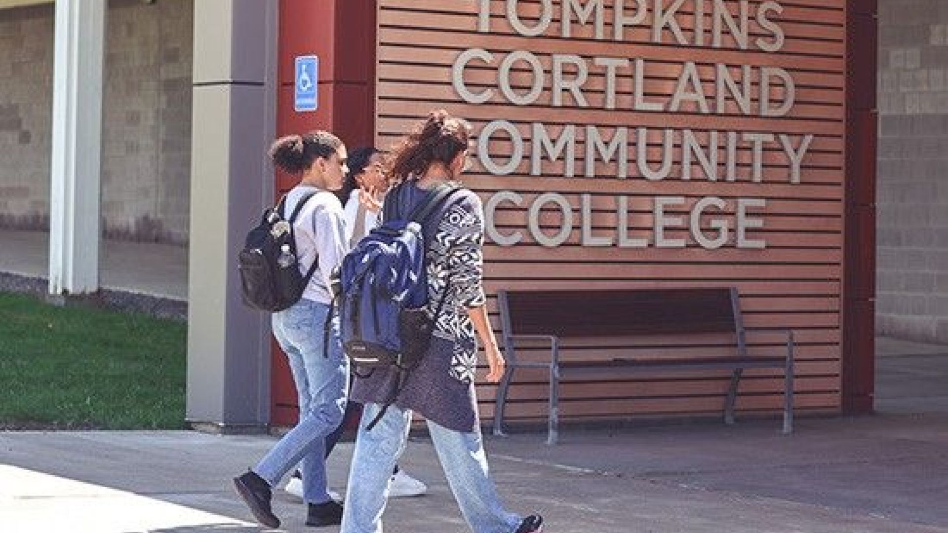 Students entering campus building