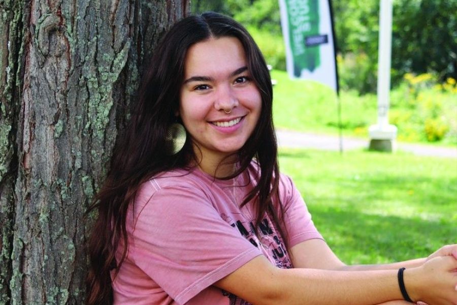 Kylie Golden-Appleton sitting outdoors