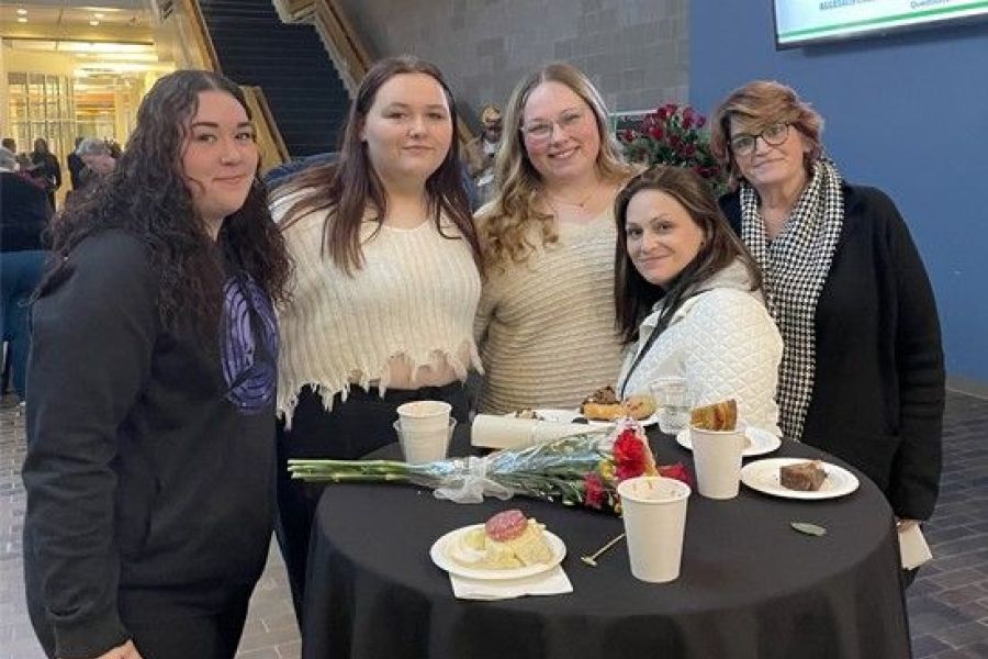 Students at reception with family
