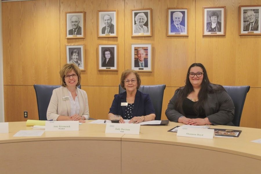 Amy Kremenek, Judy Davison, and Shannon Boyd at board meeting