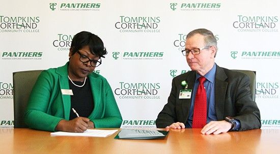 Tompkins Cortland President Orinthia Montague and CRMC President and CEO Mark Webster sign agreement